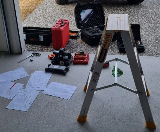 Structural inspection equipment set on a tiled floor